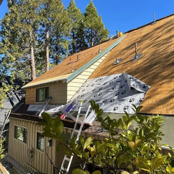 House roof under construction reroofing
