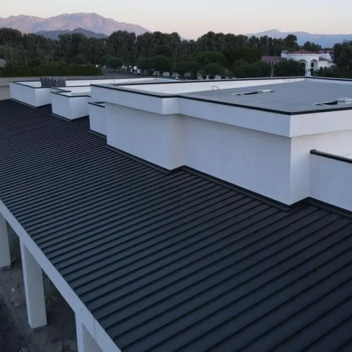 Modern flat roof with mountains and metal roofing