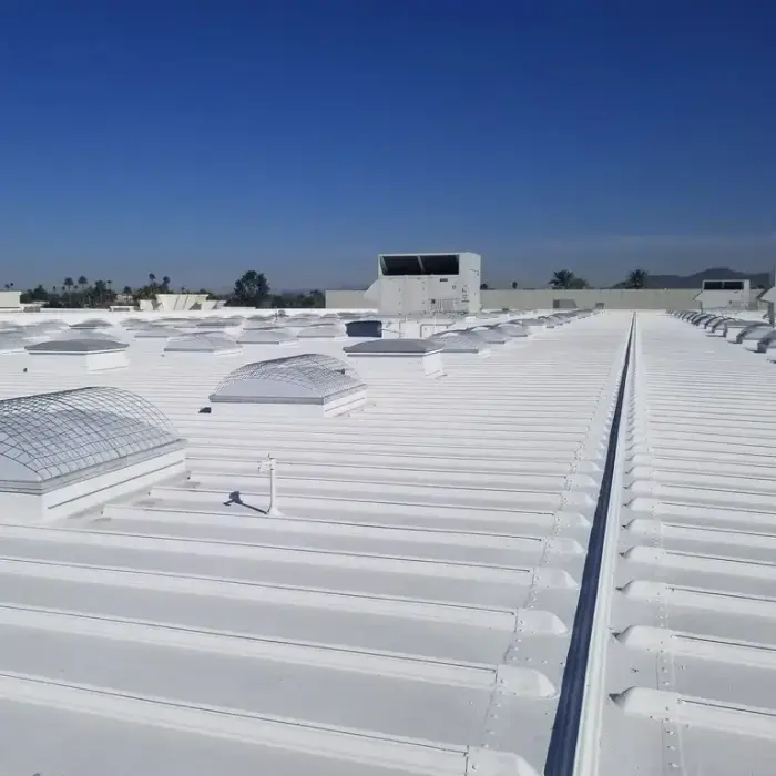 White industrial roof with roof coating
