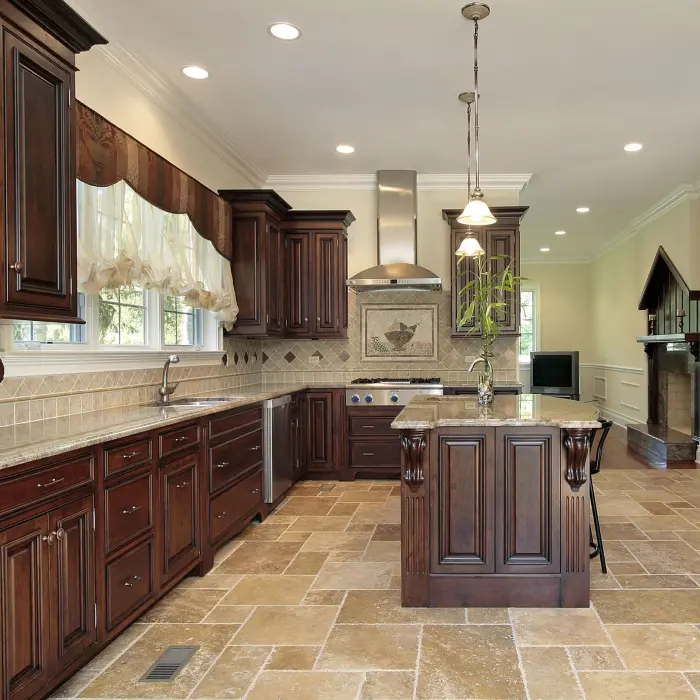 Large kitchen in luxury home with cherry wood cabinetry